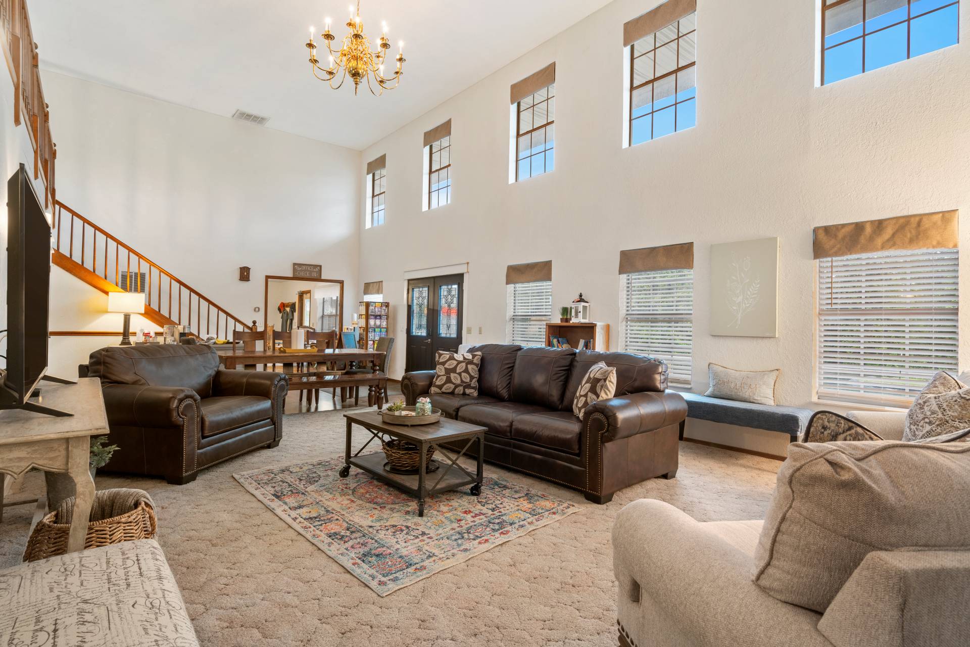 Great Room with seating, coffee, books, games, and a relaxed group atmosphere.